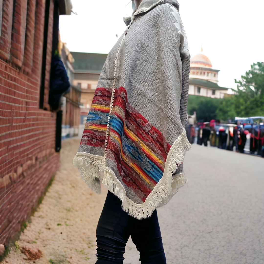 Ladies grey llama wool poncho with Red and Blue border