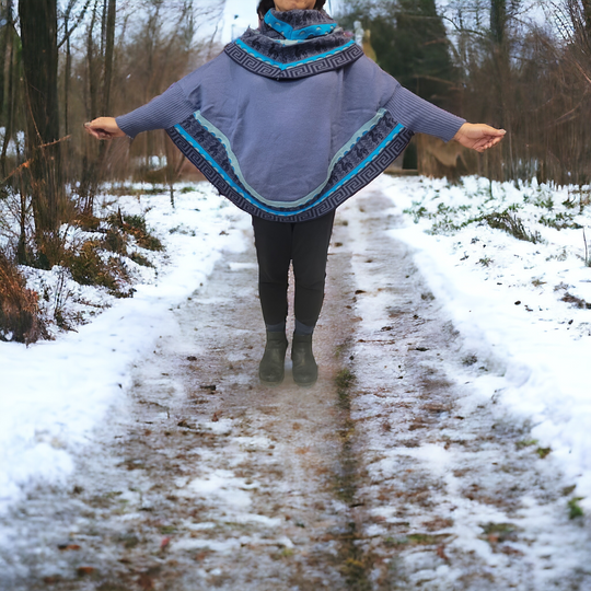 Blue poncho with sleeves is knit of alpaca fibers #0028